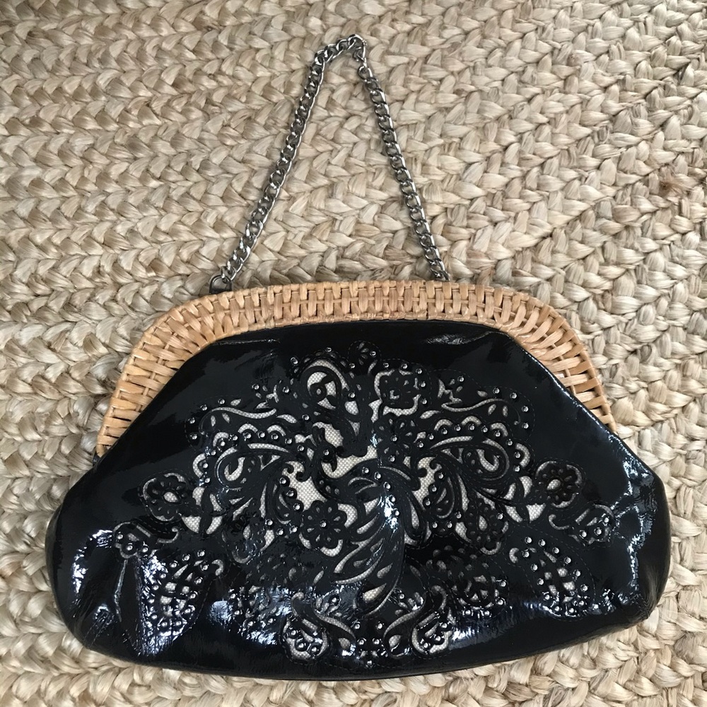 Rafe cane & laser cut blk patent leather clutch .